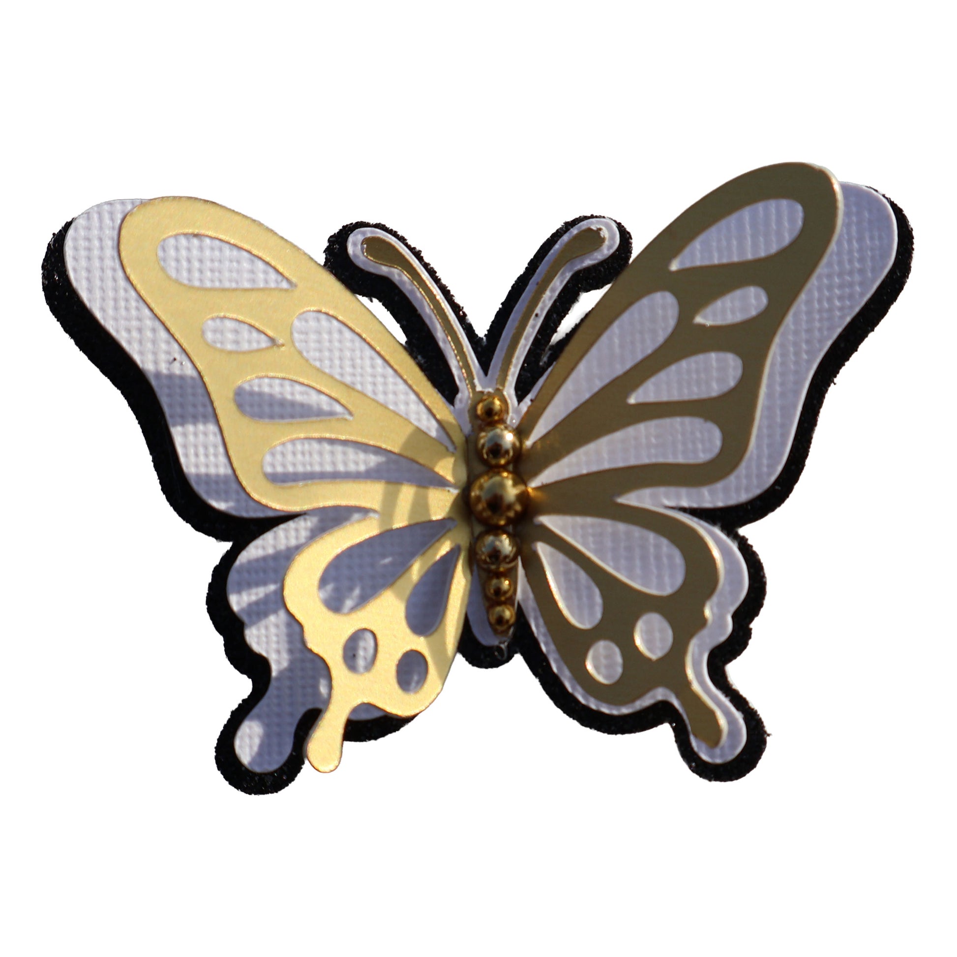 3D monarch butterfly cutout with gold foil and white layers, a black shimmer base, and gold bead centers.