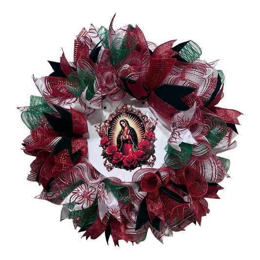Handcrafted 22 inch Our Lady of Guadalupe mesh wreath with red roses centerpiece, emerald green and crimson mesh, and white floral patterned ribbons.