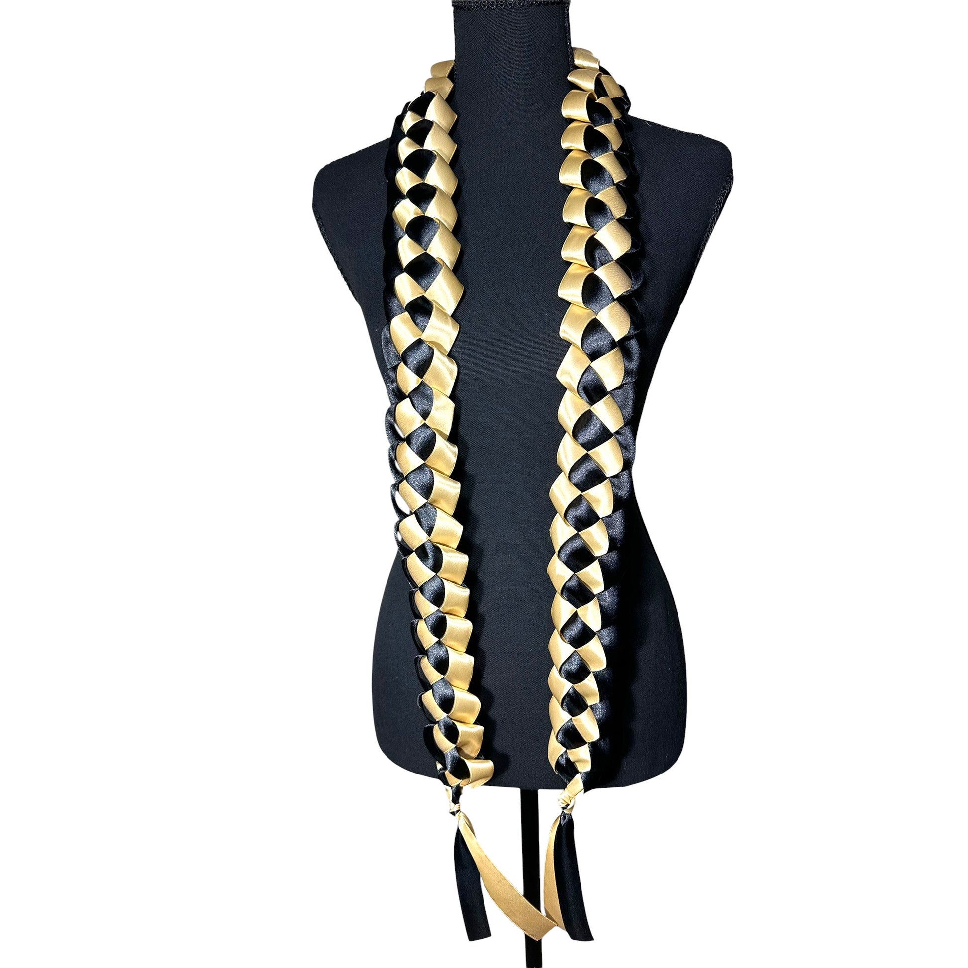 Handwoven black and gold satin ribbon graduation lei with single military braid texture.