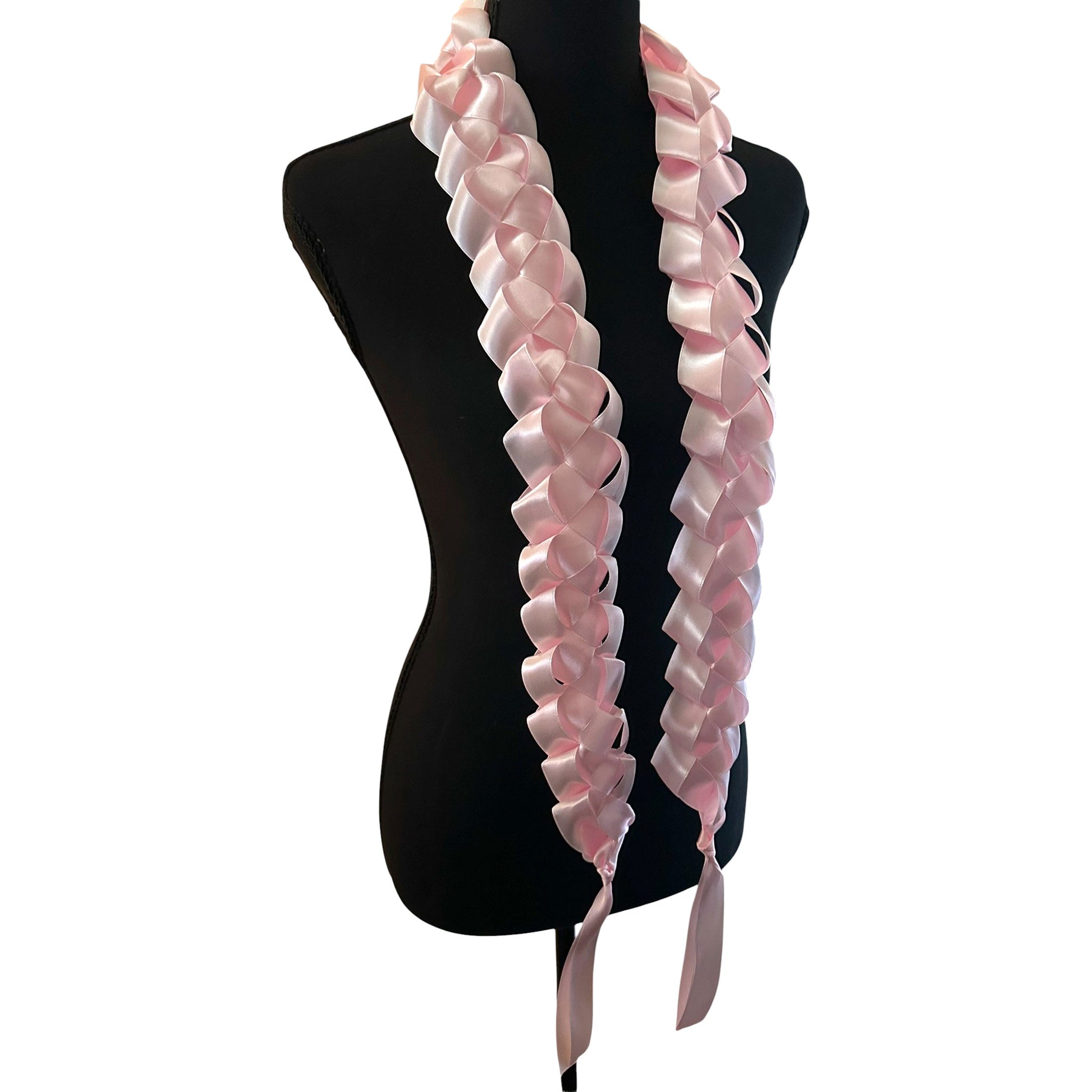 Handwoven solid light pink satin ribbon graduation lei with single military braid texture on mannequin.