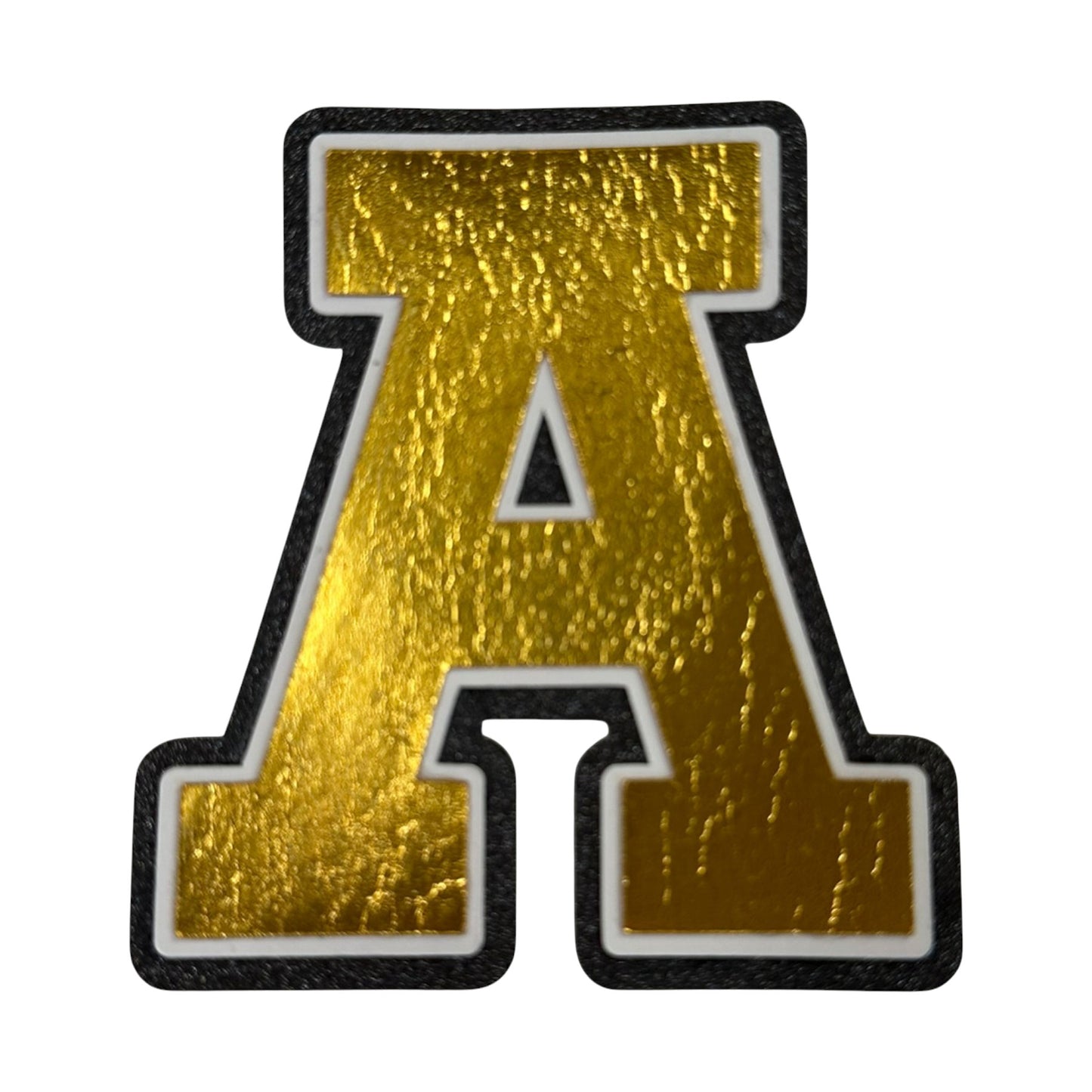 Black white and gold foil layered cardstock letter A cutout in varsity font for homecoming mums and graduation leis.