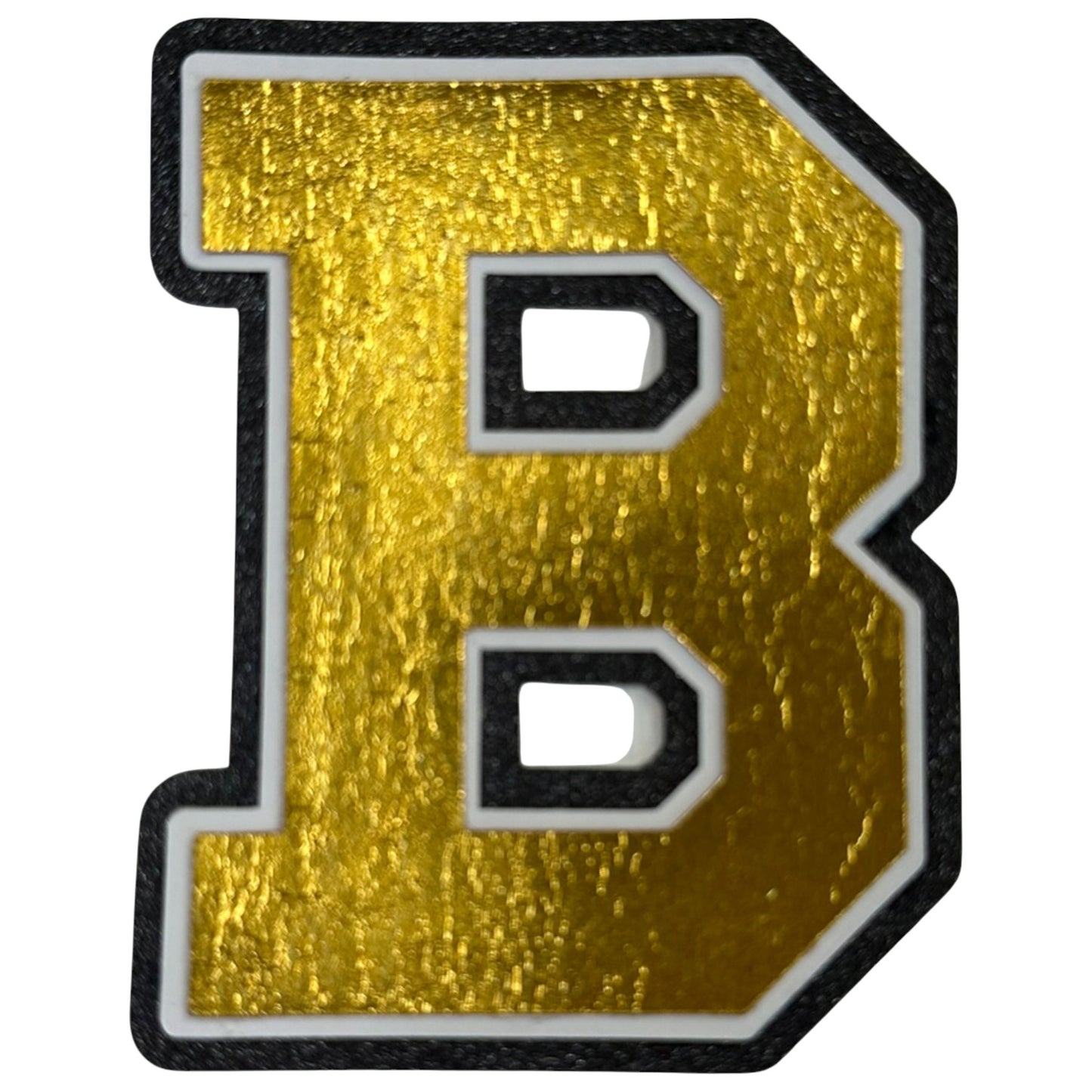 Black white and gold foil layered cardstock letter B cutout in varsity font for homecoming mums and graduation leis.