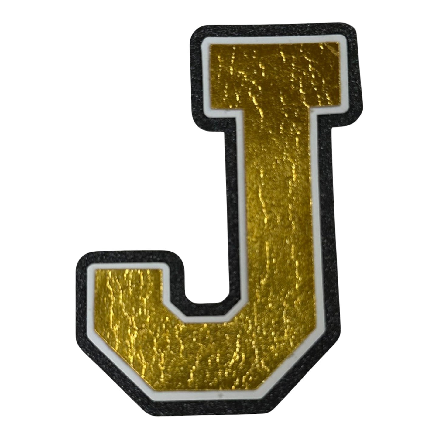 Black white and gold foil layered cardstock letter J cutout in varsity font for homecoming mums and graduation leis.