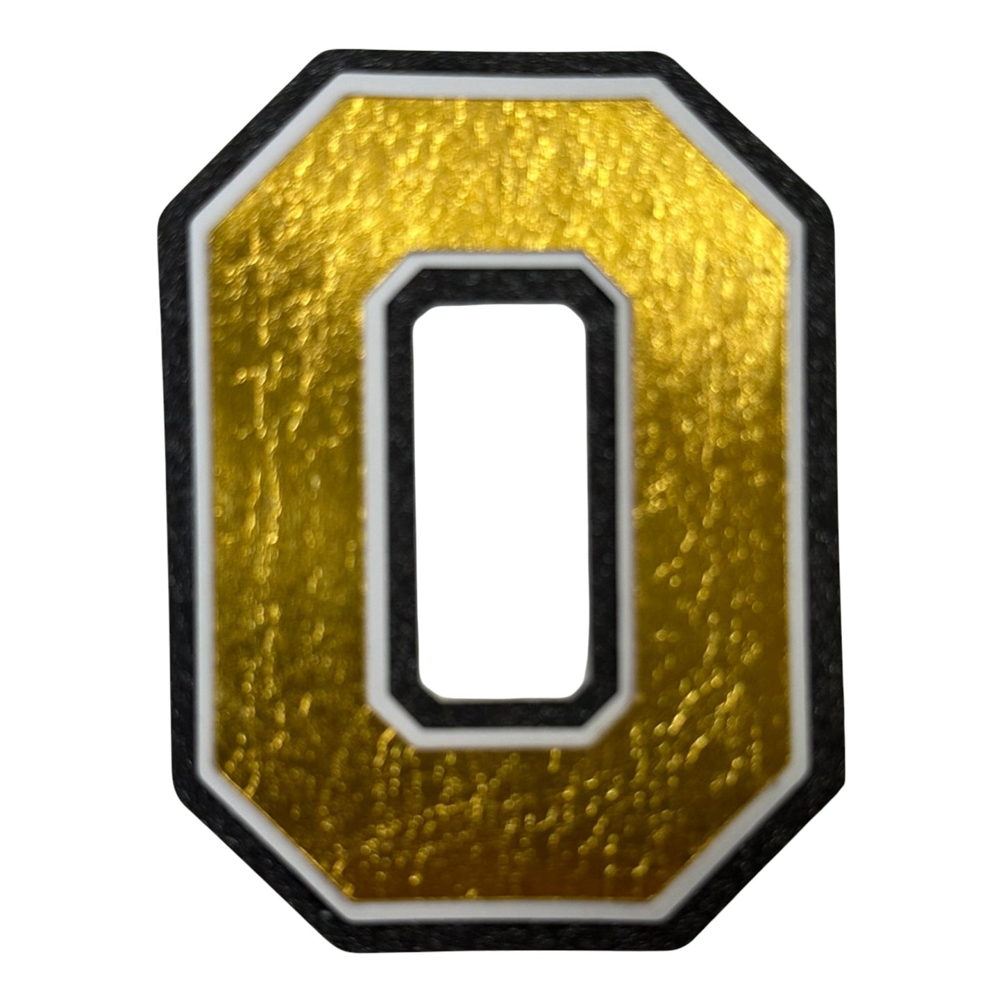 Black white and gold foil layered cardstock letter O cutout in varsity font for homecoming mums and graduation leis.