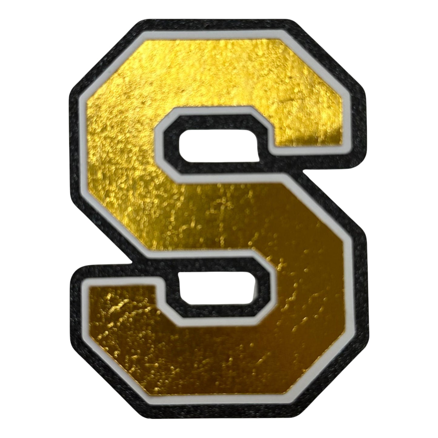 Black white and gold foil layered cardstock letter S cutout in varsity font for homecoming mums and graduation leis.