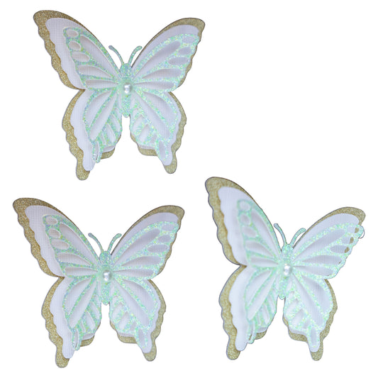 Set of three 3D butterfly cutout with iridescent mint green glitter, white cardstock, and gold glitter base with pearl center.