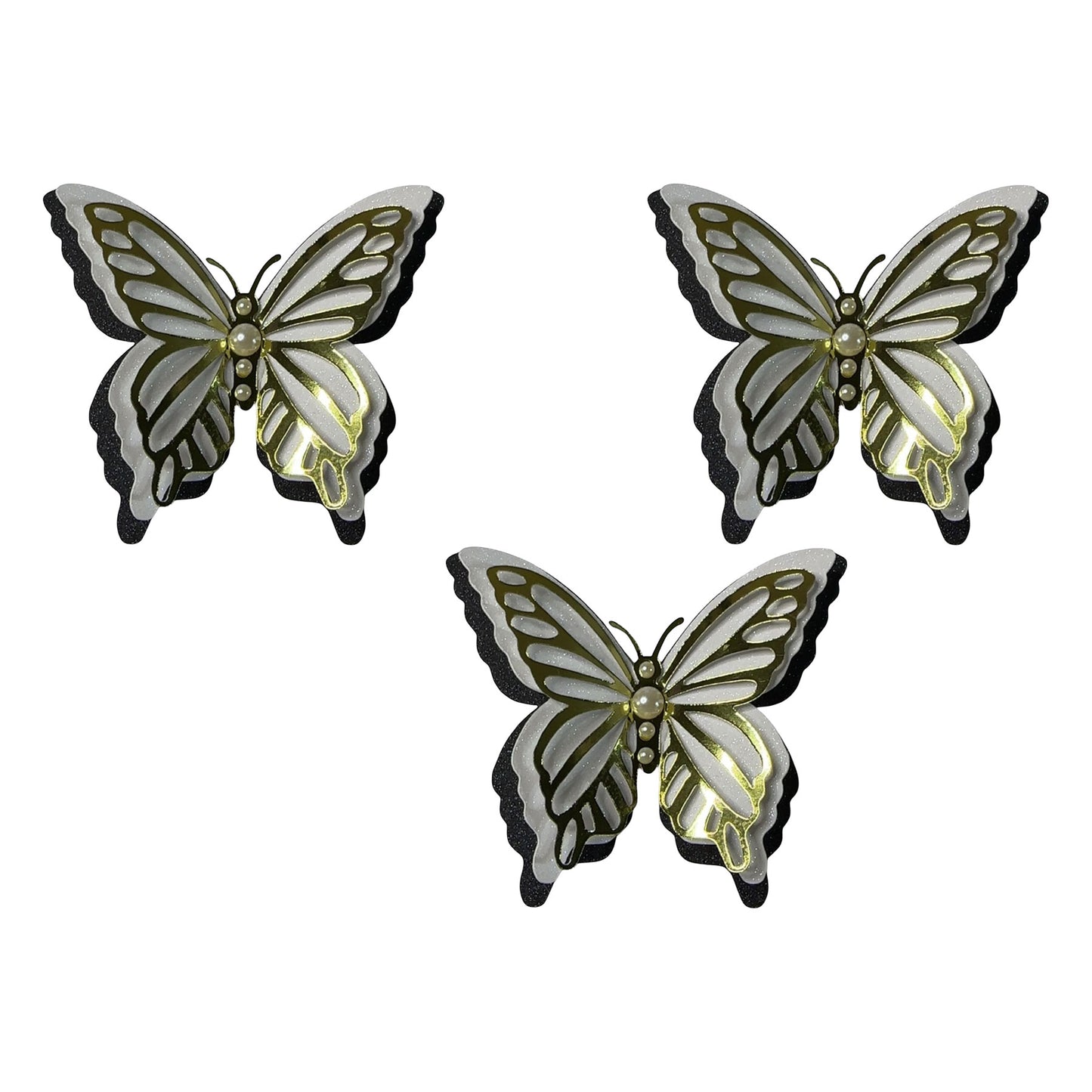 A coordinated set of three 3D butterfly spirit cutouts featuring layered Glitter Black, Glitter White, and Gold Foil wings with an iridescent pearl center.