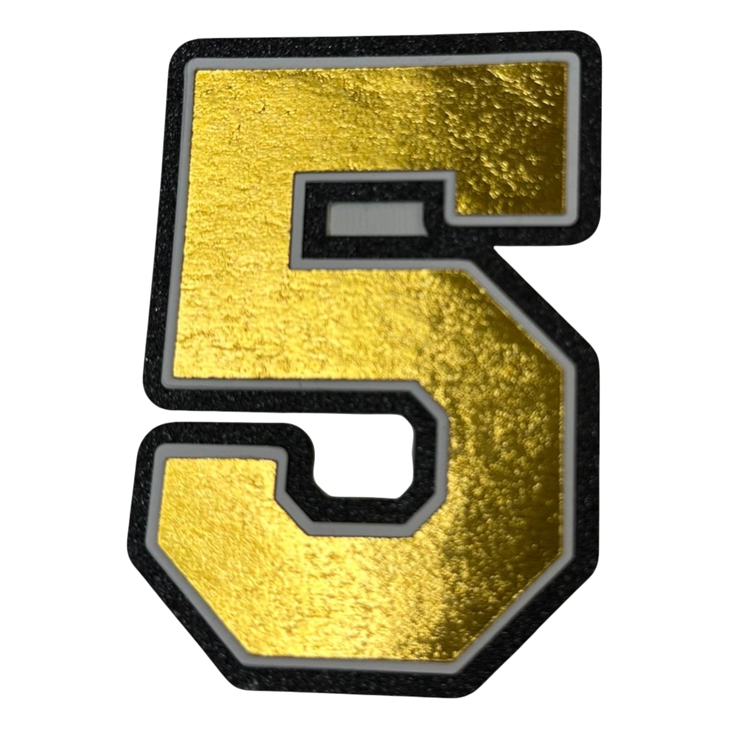 Black white and gold foil layered cardstock number 5 cutout for graduation year and jersey numbers.