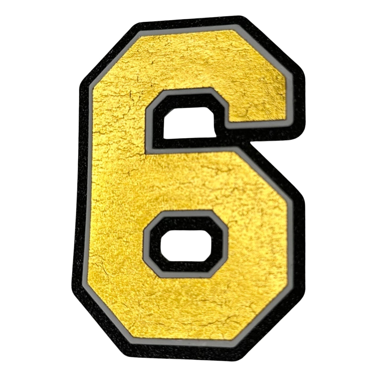 Black white and gold foil layered cardstock number 6 cutout for graduation year and jersey numbers.