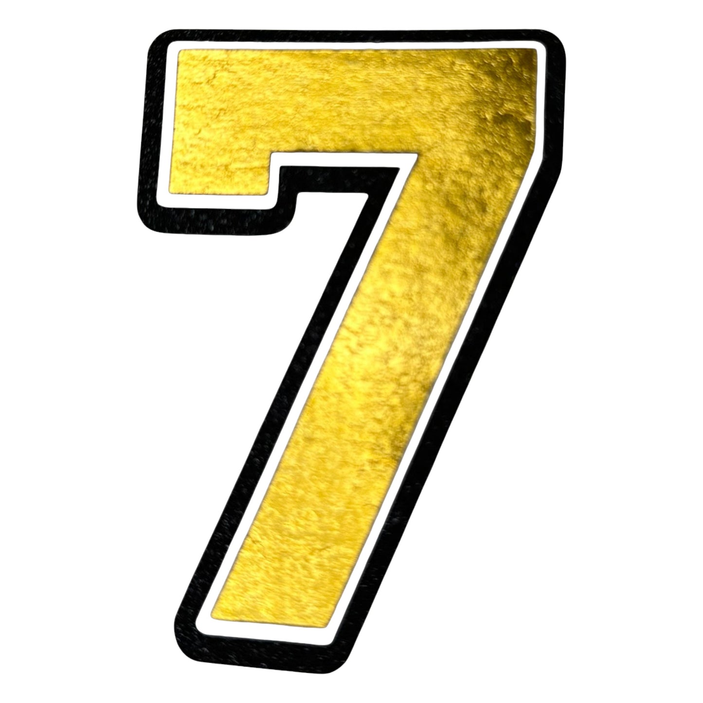 Black white and gold foil layered cardstock number 7 cutout for graduation year and jersey numbers.