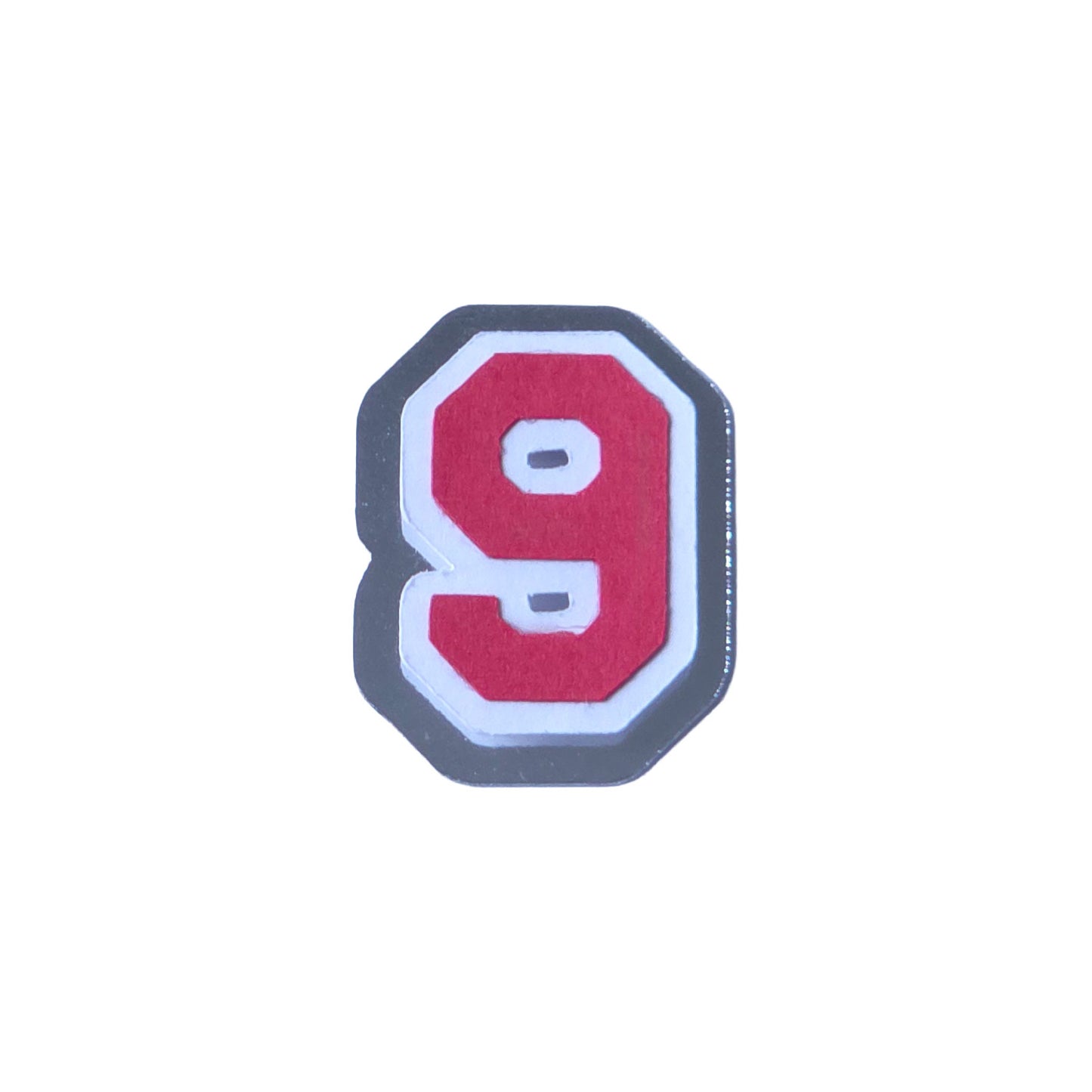 Red, white, and silver foil layered cardstock number '9' cutout in a varsity block font for homecoming mums and graduation leis.