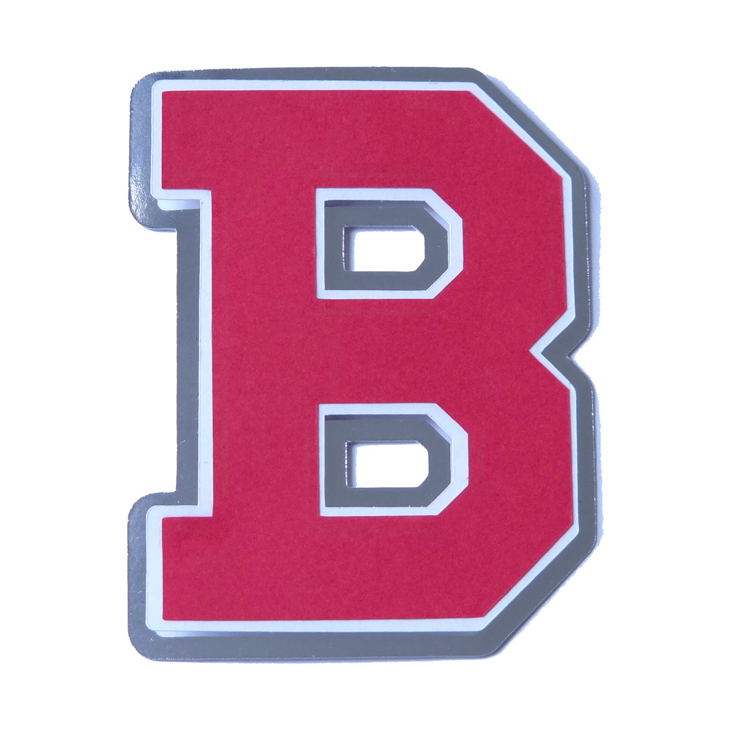 Red, white, and silver foil layered cardstock letter B cutout in a classic varsity block font for homecoming mums and graduation leis.