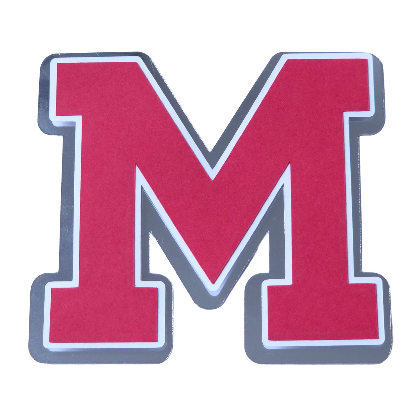 Red, white, and silver foil layered cardstock letter 'M' cutout in a classic varsity block font for homecoming mums and graduation leis.