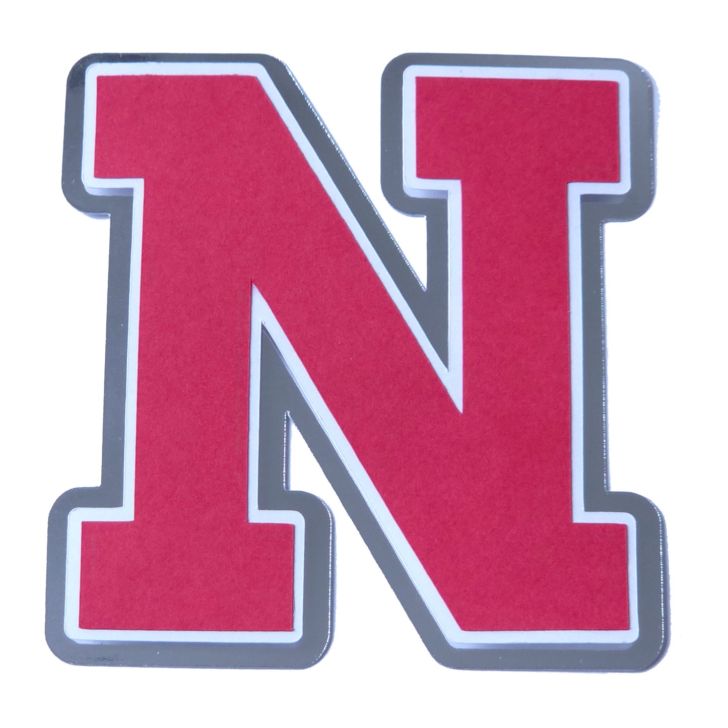 Red, white, and silver foil layered cardstock letter 'N' cutout in a classic varsity block font for homecoming mums and graduation leis.