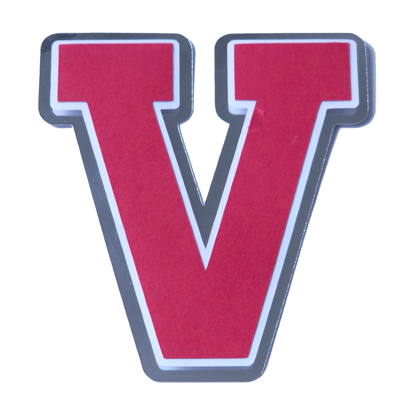 Red, white, and silver foil layered cardstock letter 'V' cutout in a classic varsity block font for homecoming mums and graduation leis.